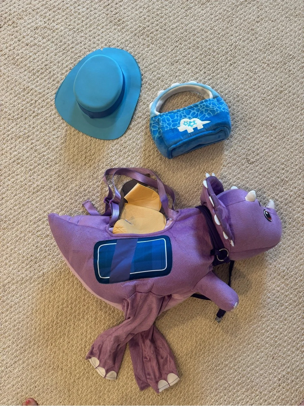 Dino ranchers tango toddler ride along costume with bag and hat
